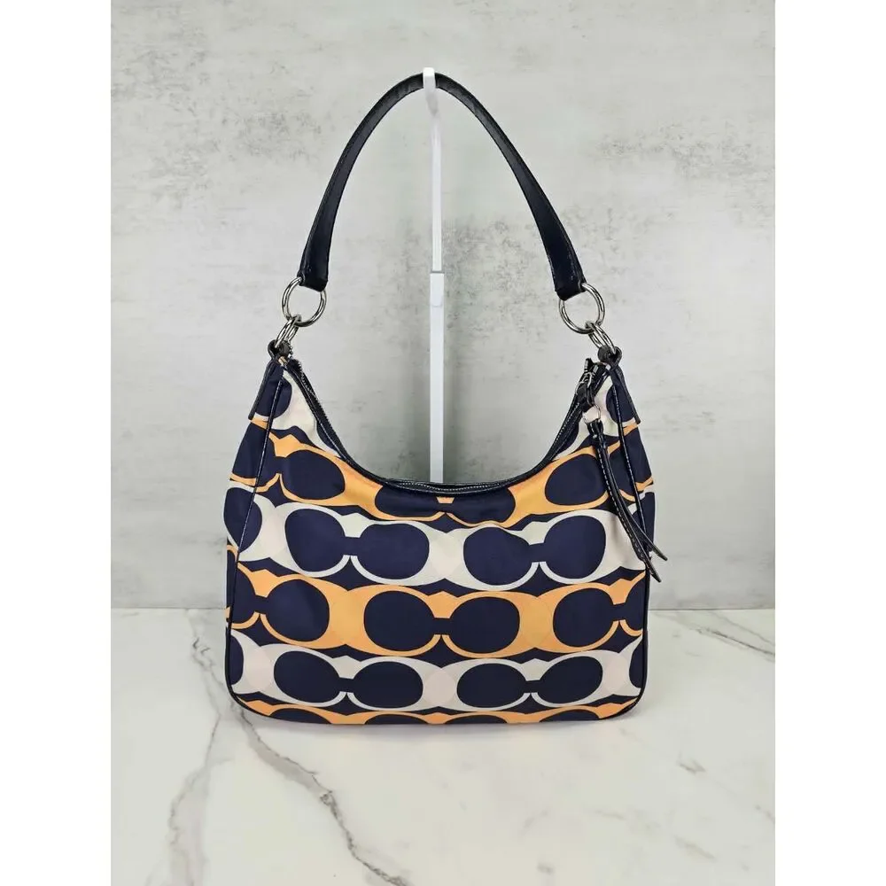Coach Poppy Linear Signature 
